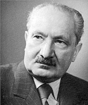 Black and white portrait photo of Martin Heidegger
