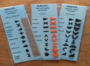 3 sets of tactile stickers(microwave, oven, washer) filled with stickers of varying shapes, each corresponding to a different button on the device(e.g. start, cancel)